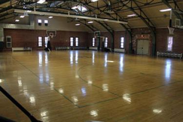 large gym with basketball hoops